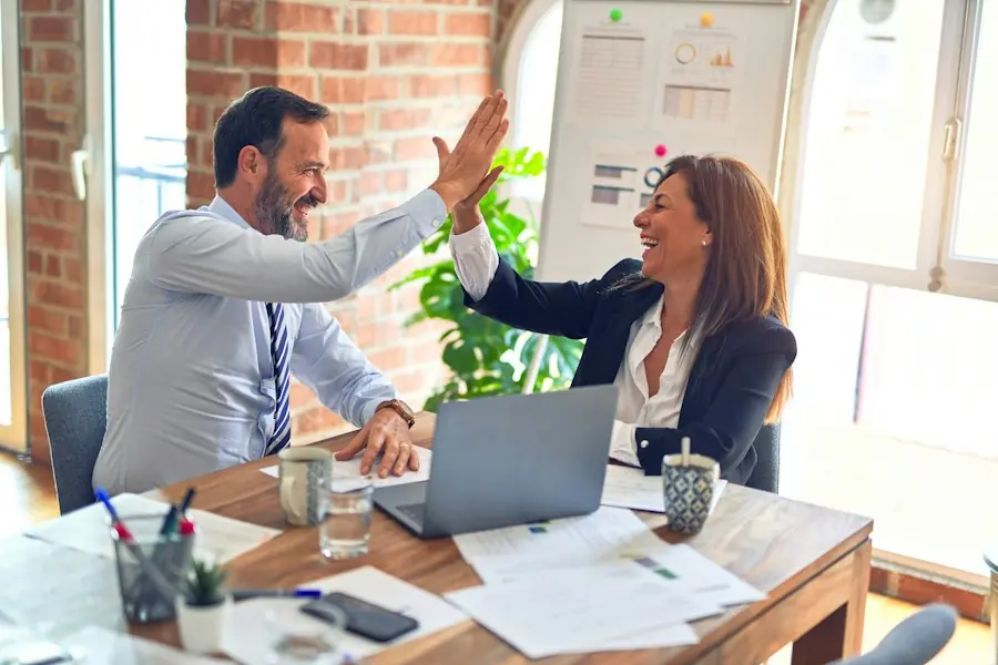 Two business partners celebrating a successful collaboration